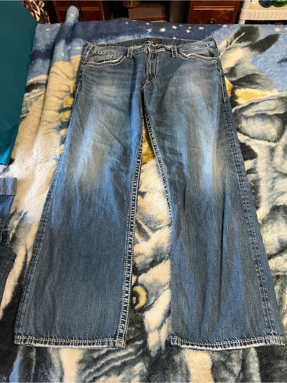 Silver Jeans Men's Bootcut Jeans in Washed Blue
